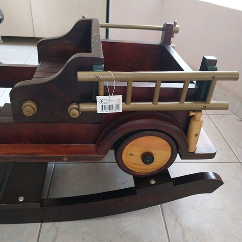 Rocking wooden car made of beech and pine
