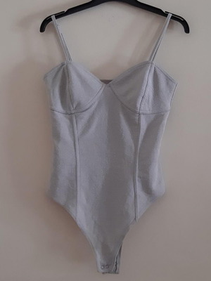 Grey bodysuit used in good condition, size S