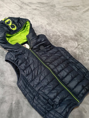 Warm vest with fur lining, size 14 years, like new