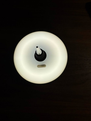Rechargeable USB illuminated bottle cap unused