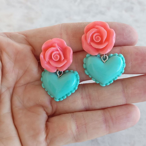 Plastic handmade earrings like new with box now