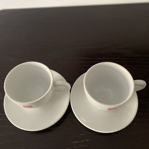 Illy cup and saucer set unused, 2 sets