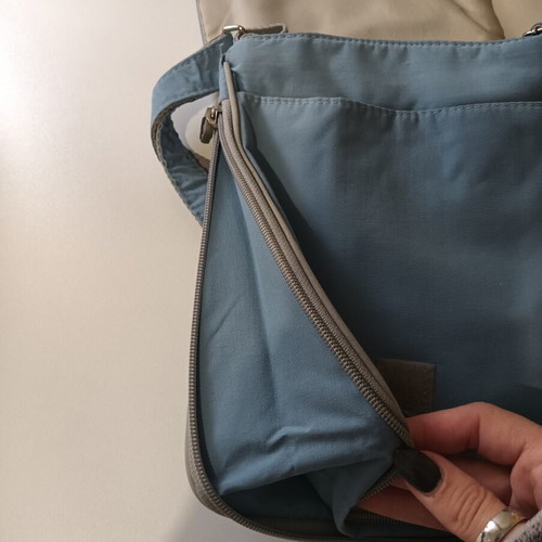 Fabric crossbody bag used, turquoise color