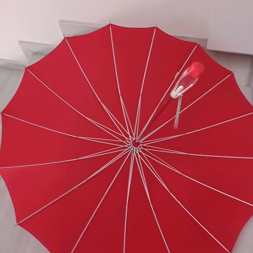 Women's red stick umbrella like new, 100% nylon