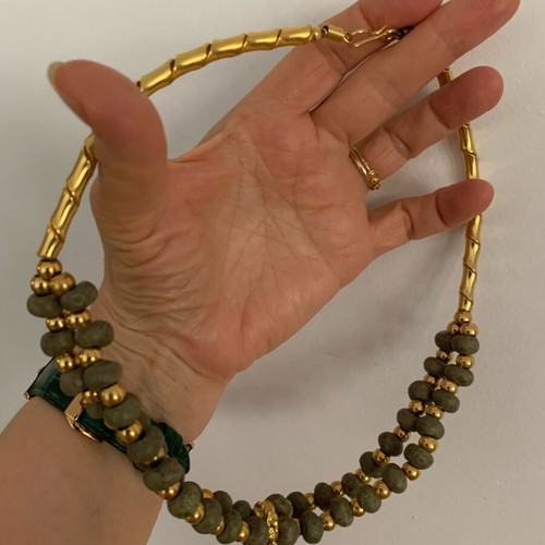 Necklace with khaki stone and gold used