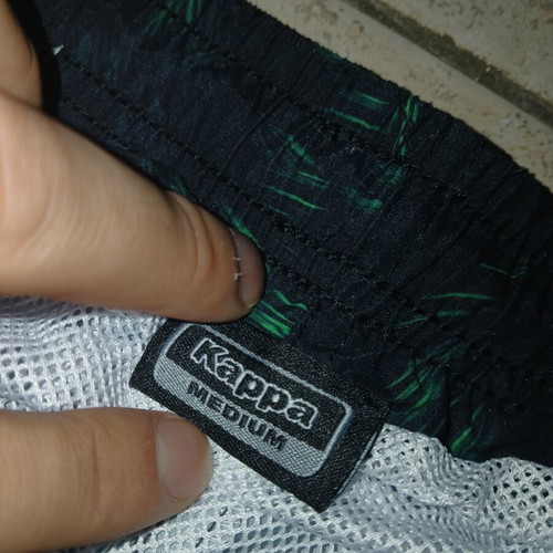 Kappa swimsuit new, size medium, black and green with pockets