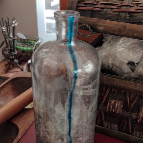 Glass bottle restored like new for decoration