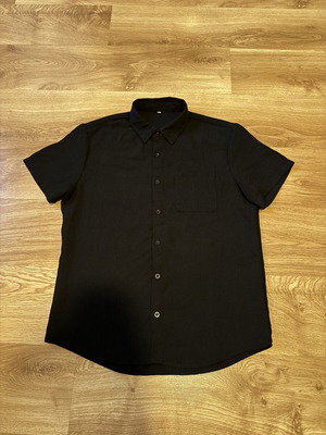 Black polo shirt, size M