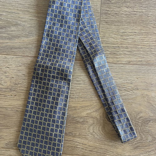 Hermes silk tie like new with geometric basketweave pattern in blue and yellow
