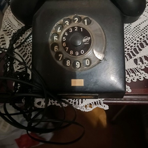 Vintage telephone device refurbished, black, wired, made in Germany