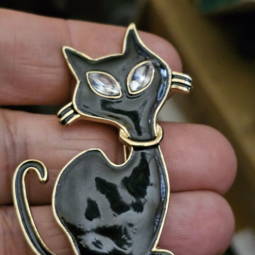 Cat brooch, black and gold