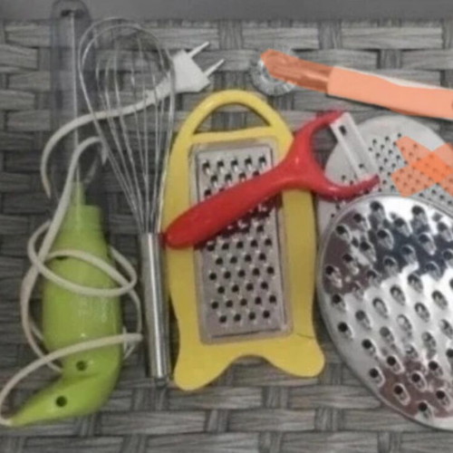 Kitchen tools set used with graters, peeler, whisk, and wire