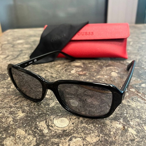 Guess women's sunglasses with red protective case and black cloth
