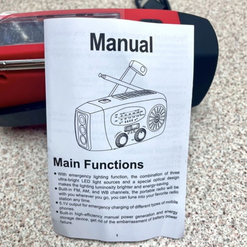Multifunctional Emergency Gadget with FM Radio, Powerbank, Solar and Hand Charging, Flashlight