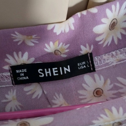Women's short skirt like new purple-pink with flowers, size L