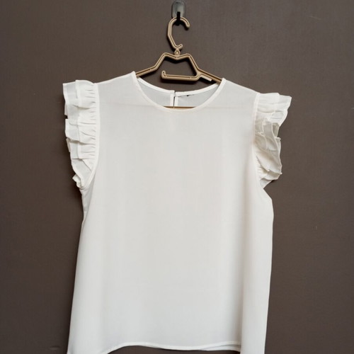 White blouse with ruffles and pearl back, L/XL