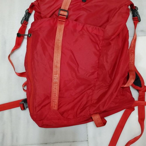 Northface red backpack used, waterproof with 4 compartments