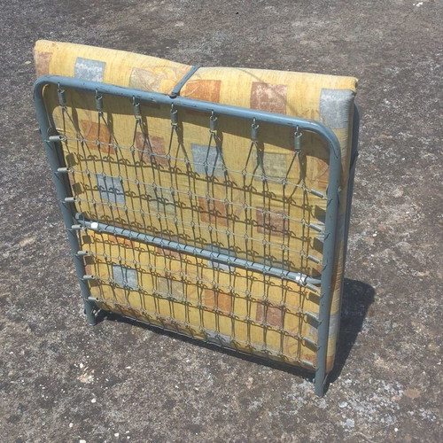 Metal folding bed with mattress used, sturdy and comfortable