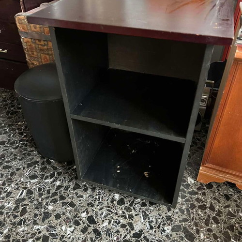 Wooden black shelf used with minor wear