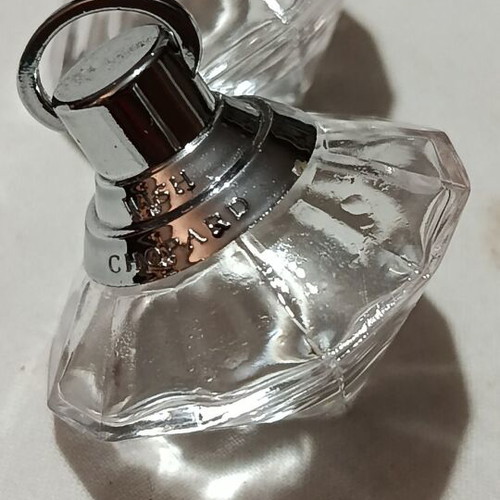 Collection of 29 empty perfume miniatures like new