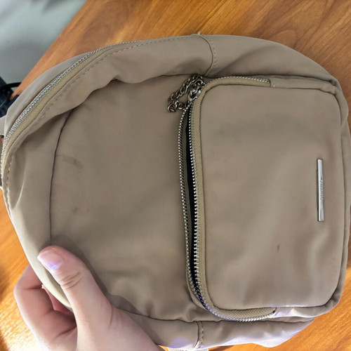 Zara beige backpack used for walking