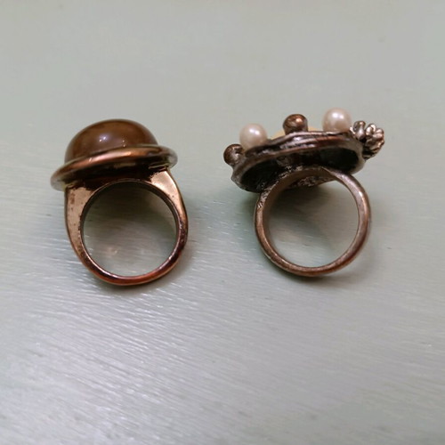 Two rings used, medium size, with metal discoloration