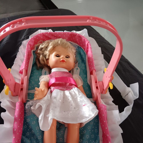 Baby Doll with Carrying Cradle like new