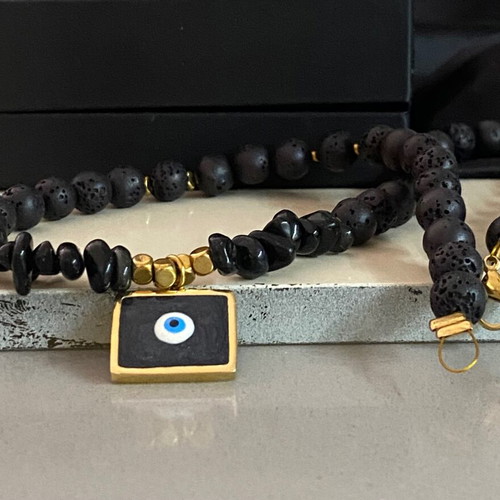 Handmade necklace with black lava stones and protective eye new