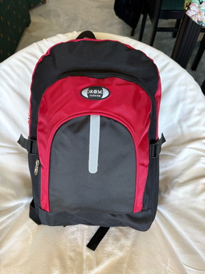 Backpack new with safety strip, black and red