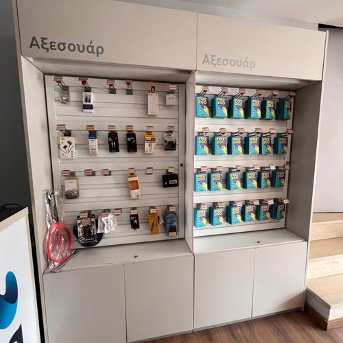 Professional wall display like new with hooks for store