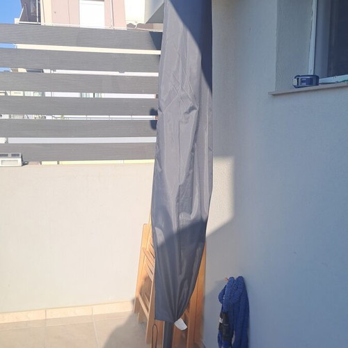 Balcony umbrella used with cover and base