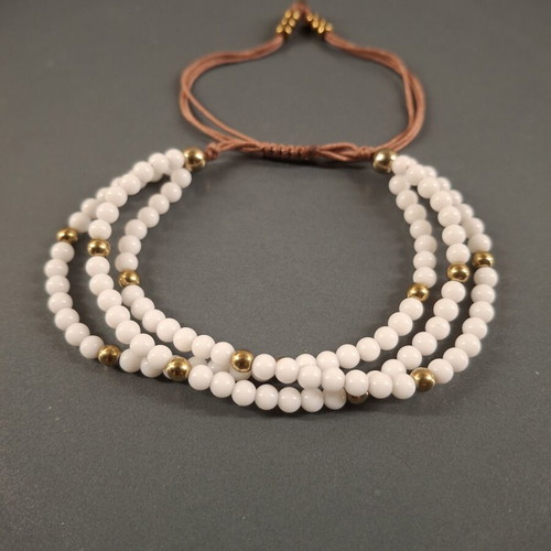 Triple bracelet with white beads and gold details new