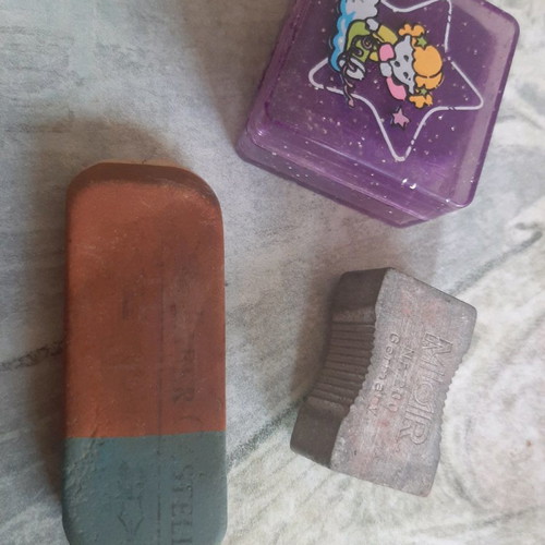 Vintage sharpener and erasers used, set