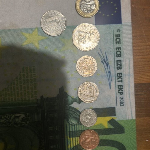 Coin set used, 1 Israel, 1 Netherlands, 9 England