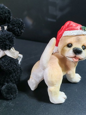 Vintage collectible dog figurines like new