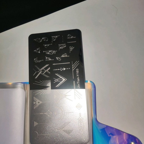 Nail stamping plates like new with storage book