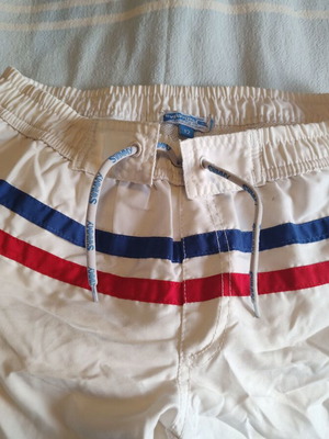 Boys' swim shorts size 12 like new, striped, white
