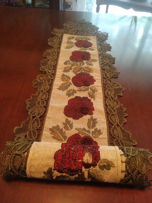 Intricate embroidery with roses and hand stitching, new