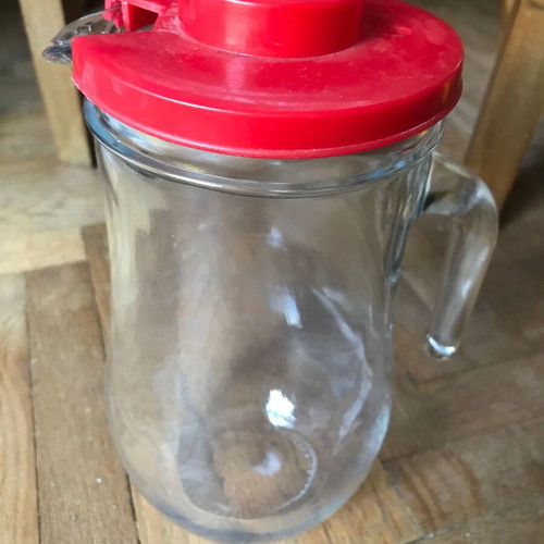 Glass jug with plastic lid used, retro style