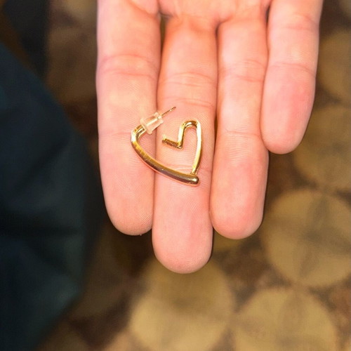 Heart-shaped earrings used, gold color