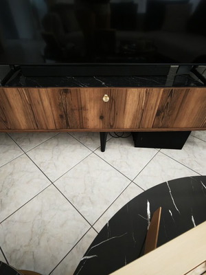 TV stand used, walnut color with black marble and gold knobs