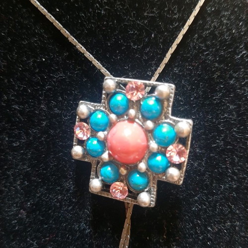 Cross necklace with stones used