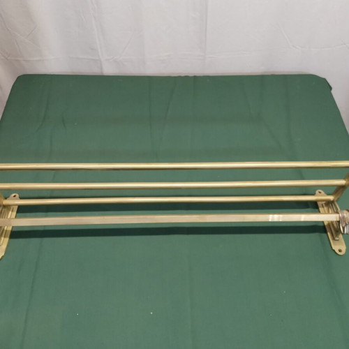 Brass wall-mounted hanger used