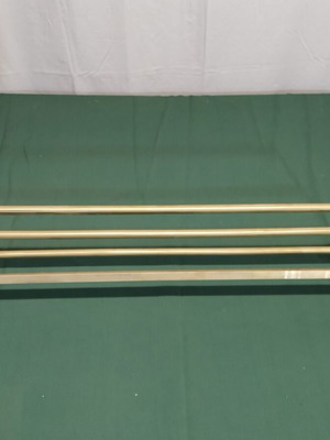 Brass wall-mounted hanger used