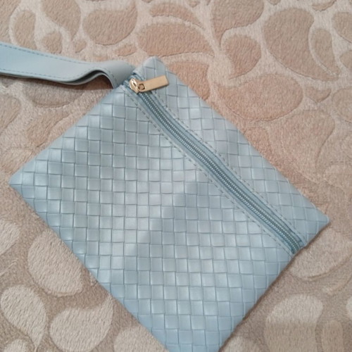 Light blue pouch and toiletry bag