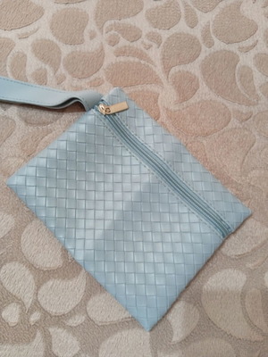 Light blue pouch and toiletry bag