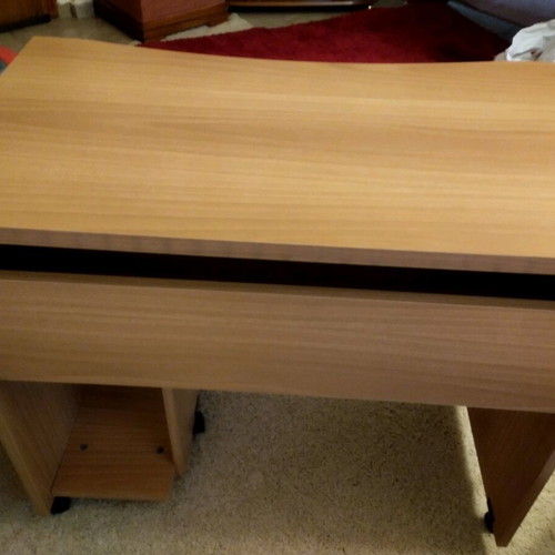 Desk with sliding shelf in walnut color Neoset like new