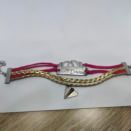 One Direction collectible bracelet like new with metal details