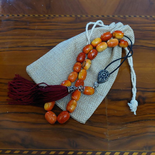 Worry beads from red coral root like new with 21+1 beads and silver elements