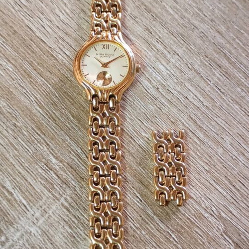 Nina Rossi wristwatch gold like new, women's